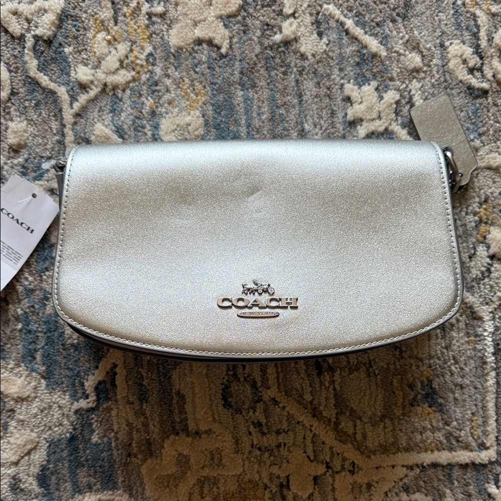 COACH leather Metallic Silver Clutch with shoulder strap, brand new never used